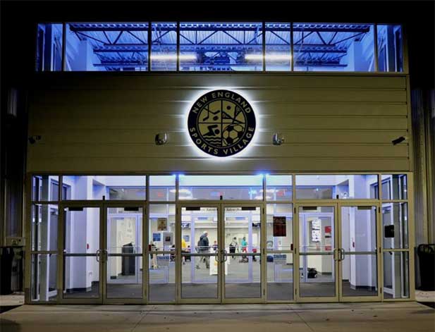 The view of the front entrance to NEW ENGLAND SPORTS VILLAGE regional center project,  leading the visitor to the expansive facilities. The New England Sports Village is a planned athletic, entertainment, and hospitality complex in Attleboro, Massachusetts.  The first phase of this project by Ashcroft Sullivan (a joint venture of professionals with active experience in banking, finance, international business, law, governance, media and technology   committed to its vision of creating sustainable paradigm shifts in Indo US relations.